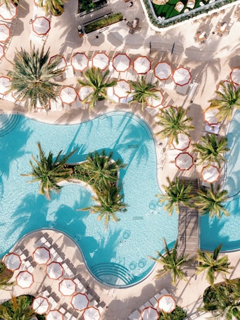 3 outdoor pools, cabanas (surcharge), pool umbrellas