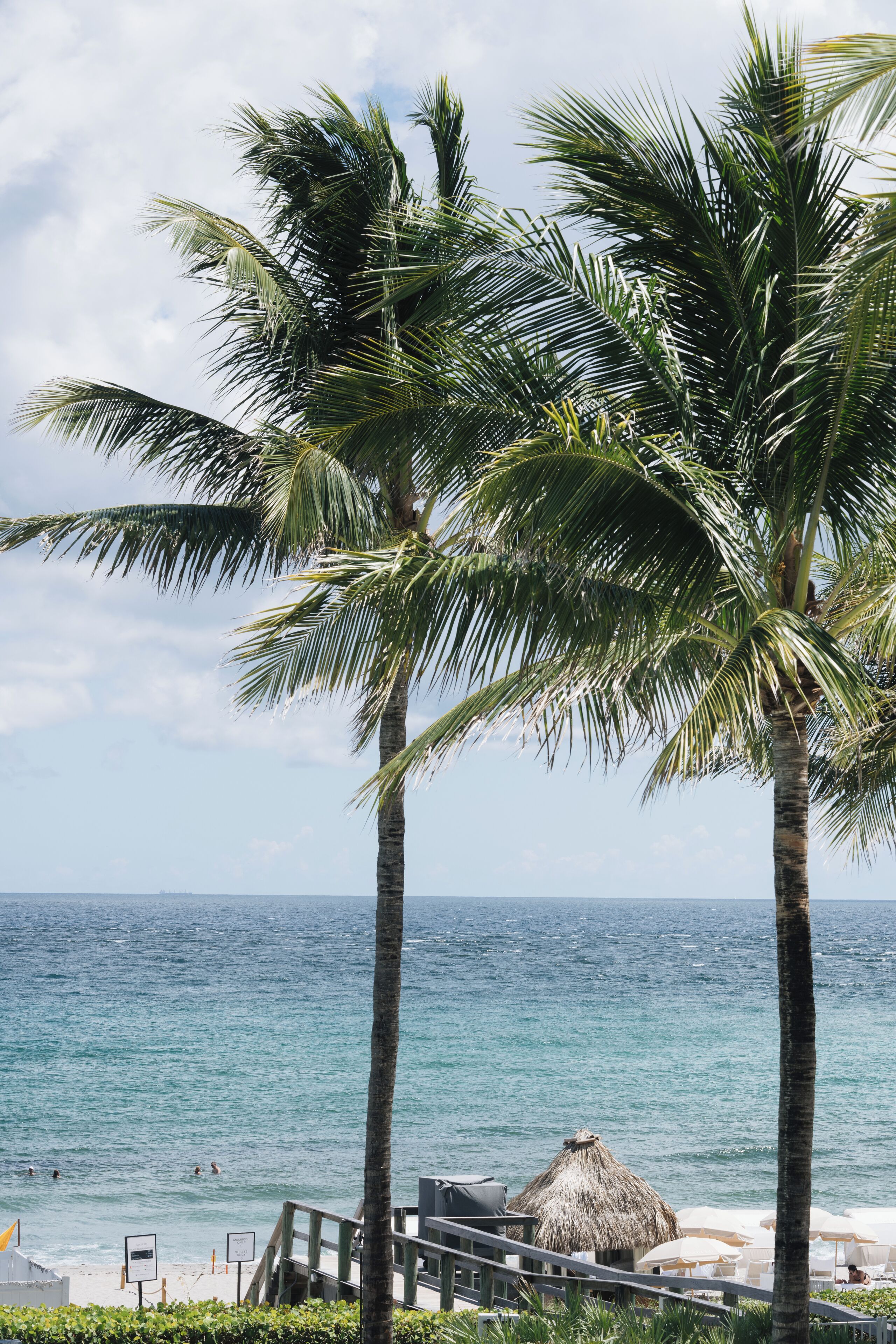 private beach nearby, white sand, free beach shuttle, beach cabanas