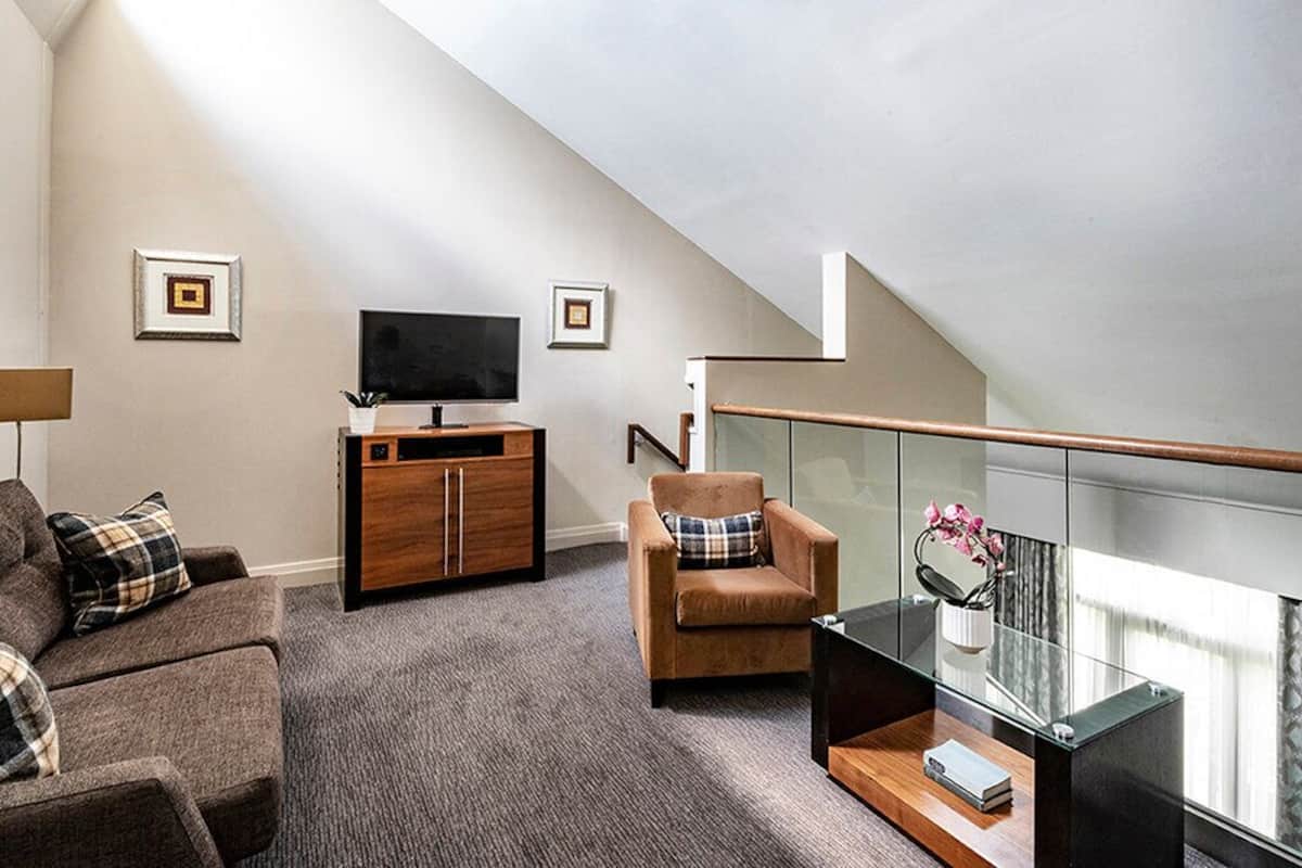 junior suite | living area | lcd tv, dvd player, pay films