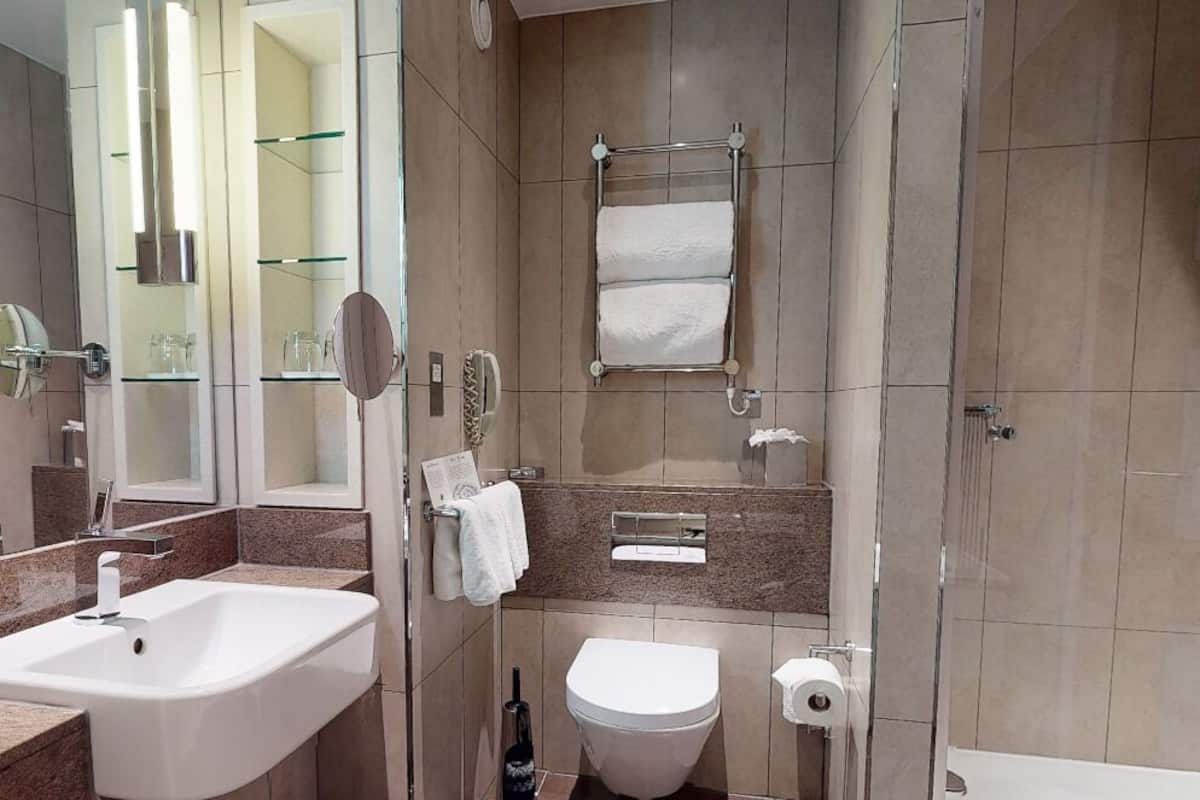 designer toiletries, hair dryer, bathrobes, towels