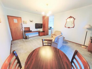 Habitación | Zona de estar | Una televisión de pantalla plana