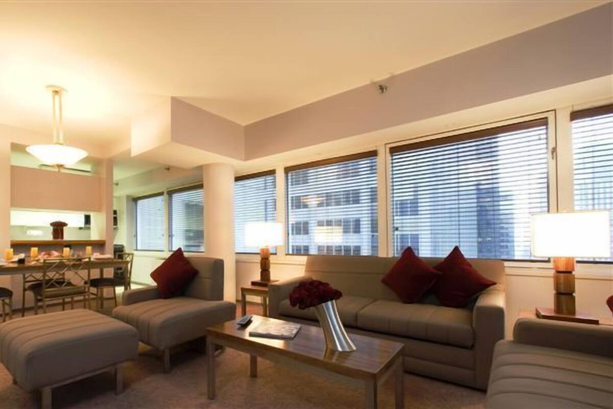 Two Bedroom Suite, One King and One Queen Bed | Living room