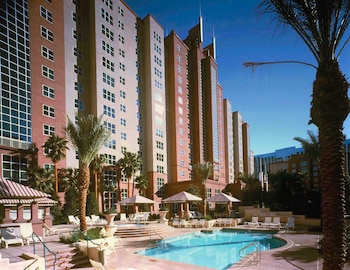 Seasonal outdoor pool, open 8:00 AM to 10:00 PM, sun loungers at Hilton Grand Vacations Club Flamingo Las Vegas