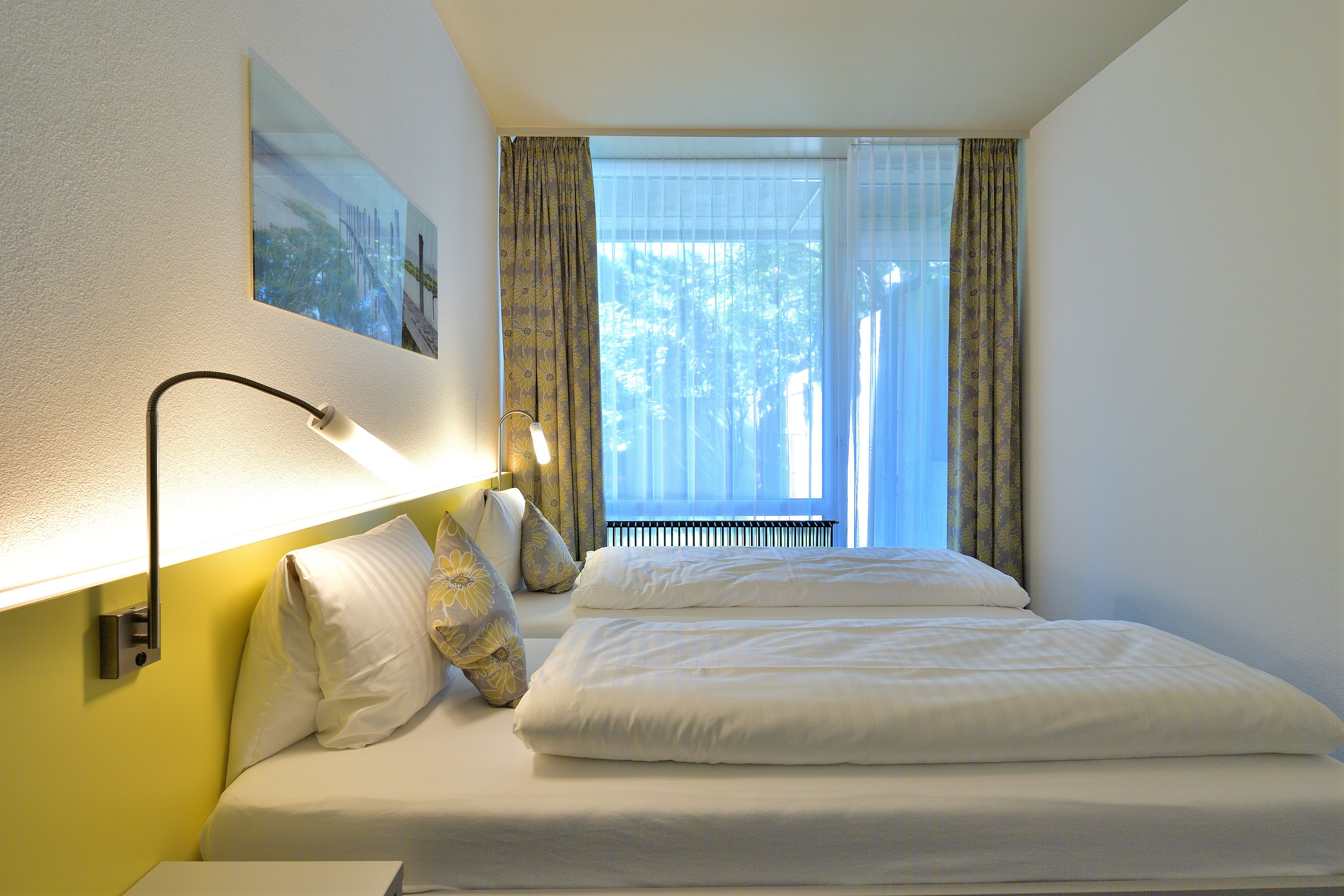 comfort double room | premium bedding, in-room safe, desk, blackout curtains