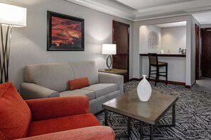 Premium bedding, desk, laptop workspace, iron/ironing board