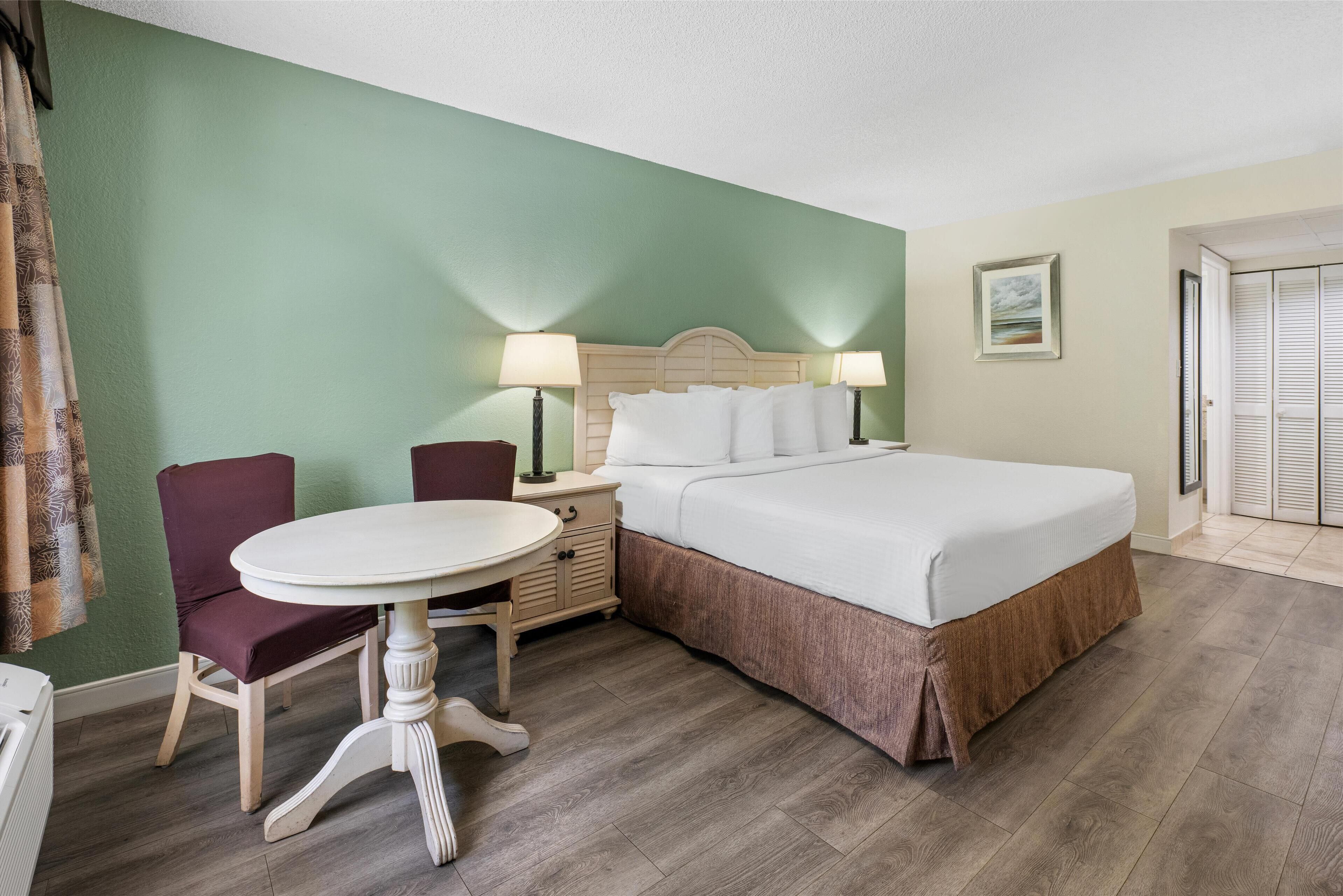 standard room, 1 king bed, refrigerator & microwave, pool view | 1 bedroom, premium bedding, in-room safe, laptop workspace