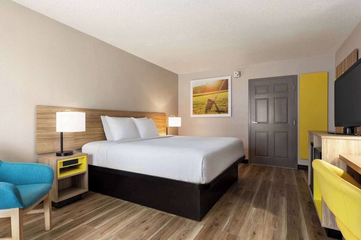 Blackout drapes, iron/ironing board, WiFi (free), alarm clocks