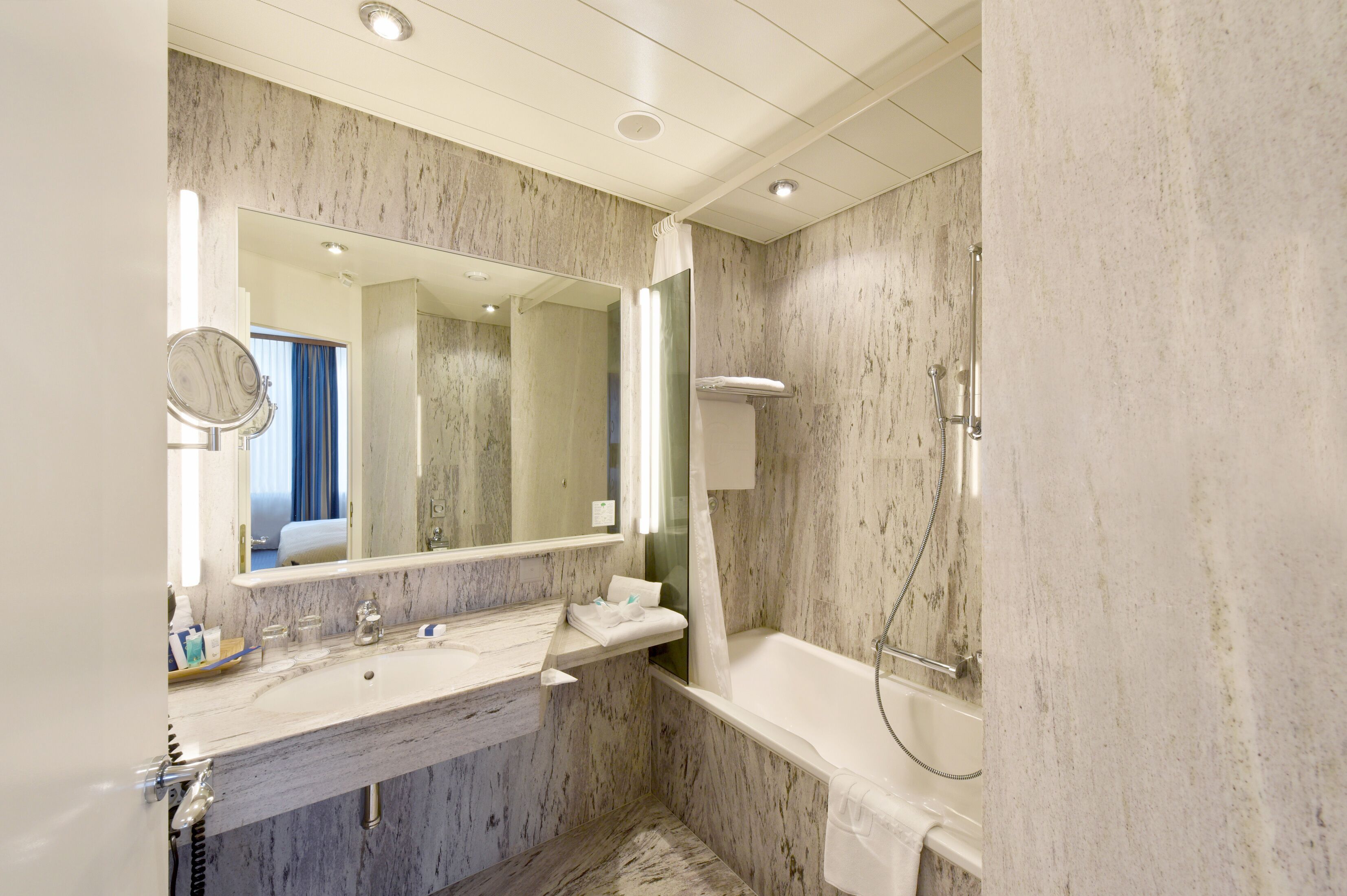 combined shower/bathtub, free toiletries, hair dryer, towels