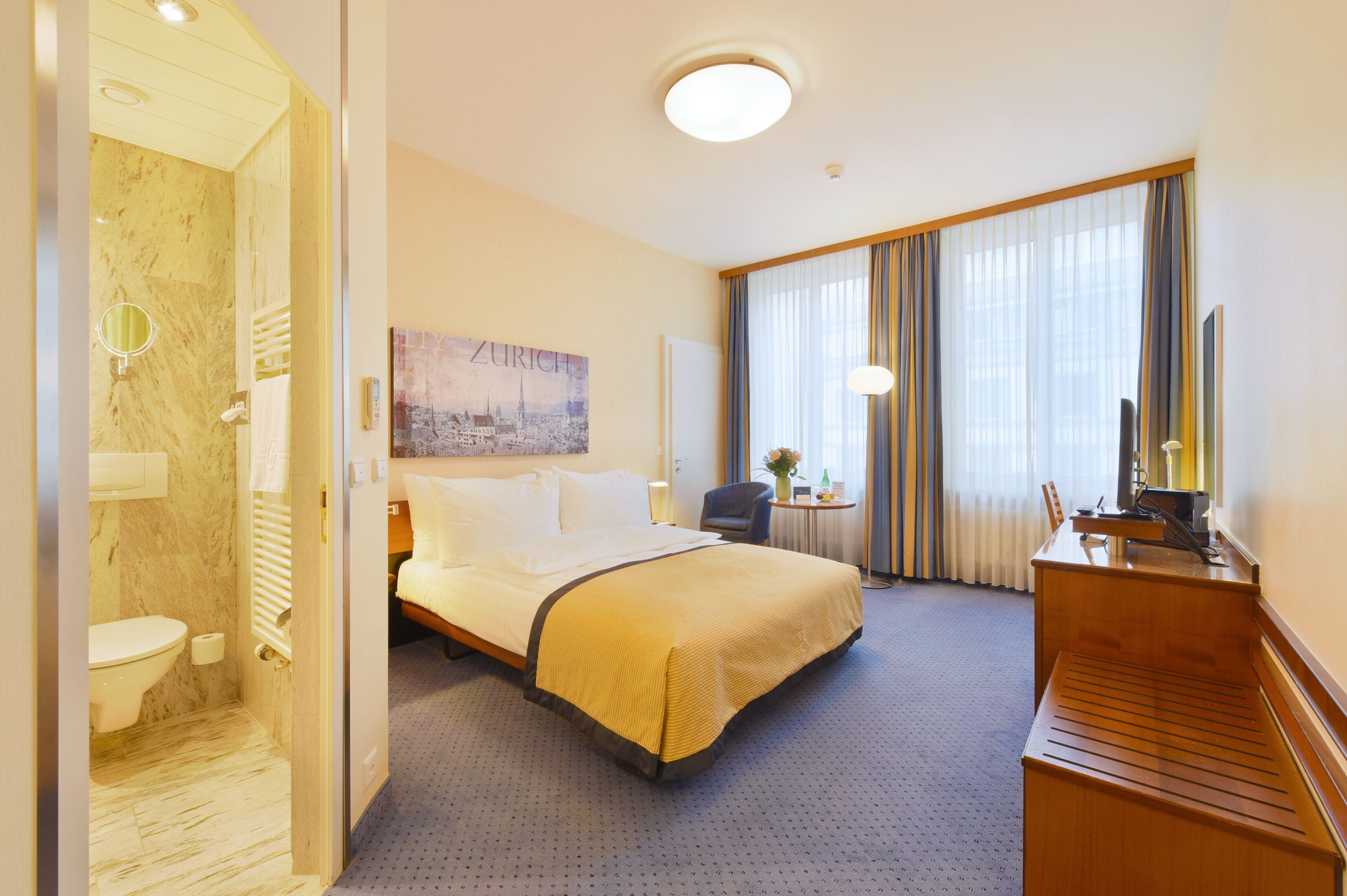 comfort single room | premium bedding, minibar, in-room safe, desk