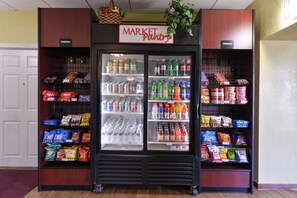 A vending machine with a variety of snacks and drinks, including chips, sodas, and bottled water. - Red Roof Inn Chambersburg (Chambersburg)