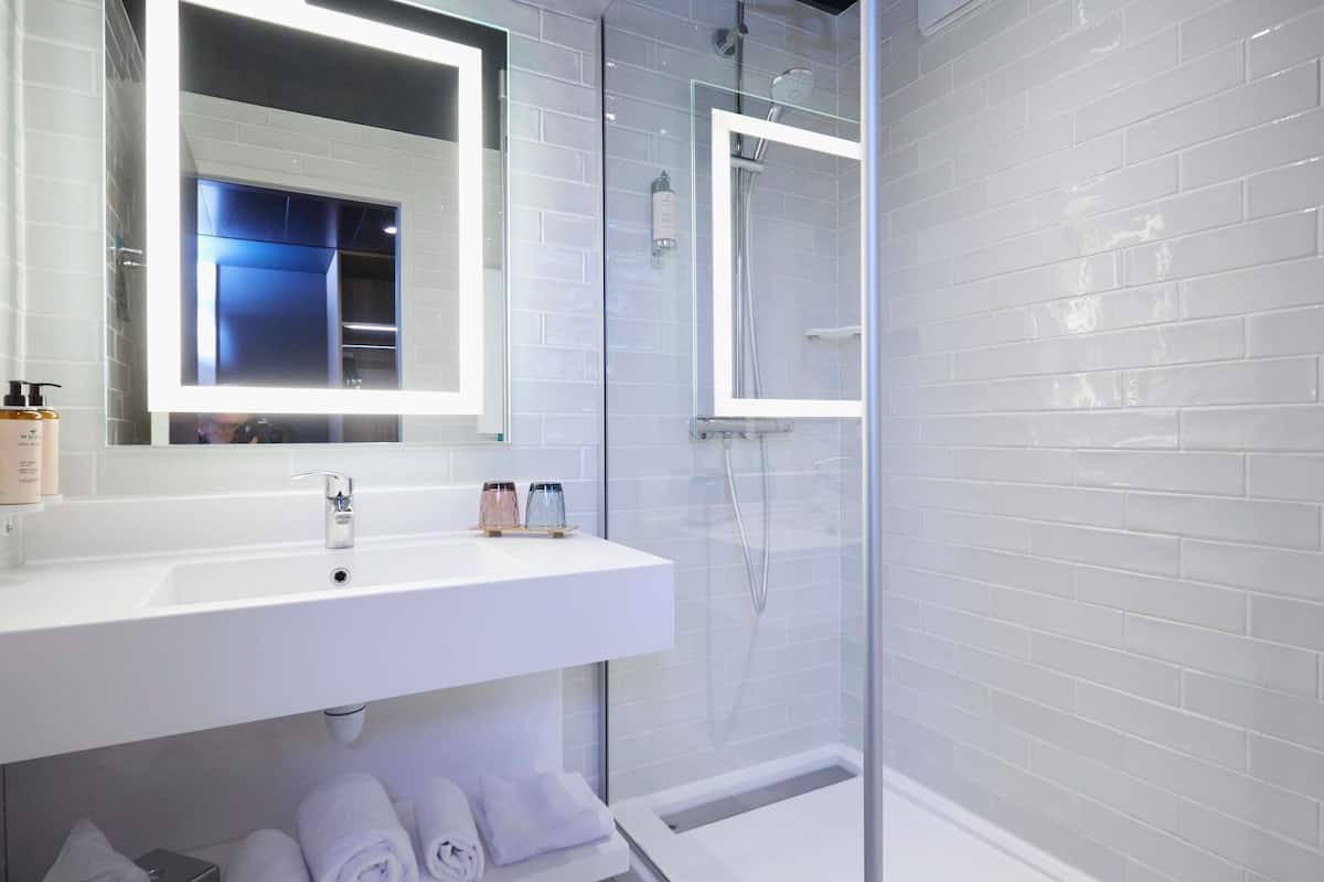 Premium bedding, desk, blackout curtains, soundproofing