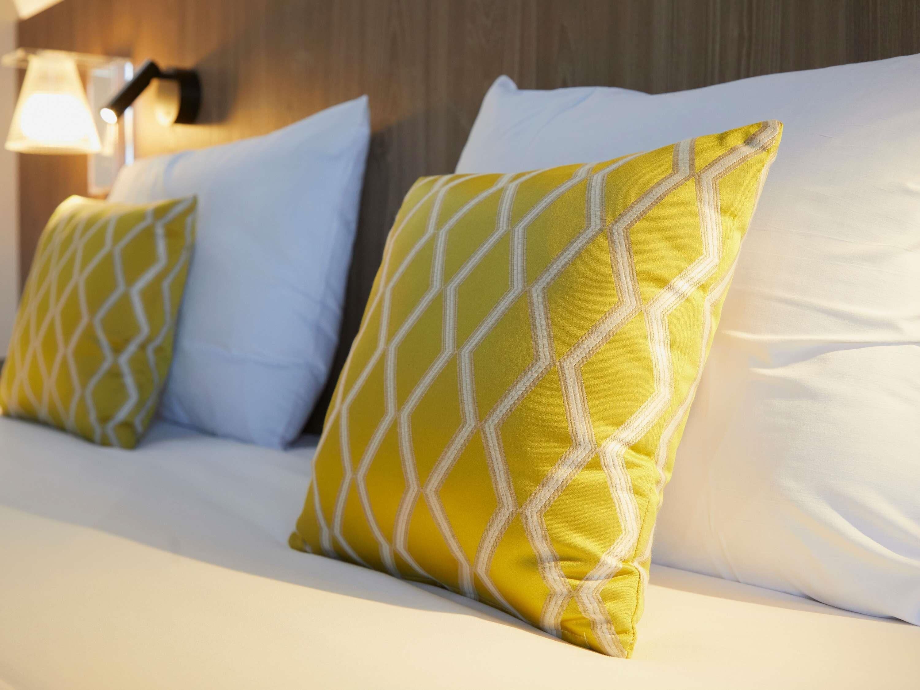 Premium bedding, desk, blackout curtains, soundproofing