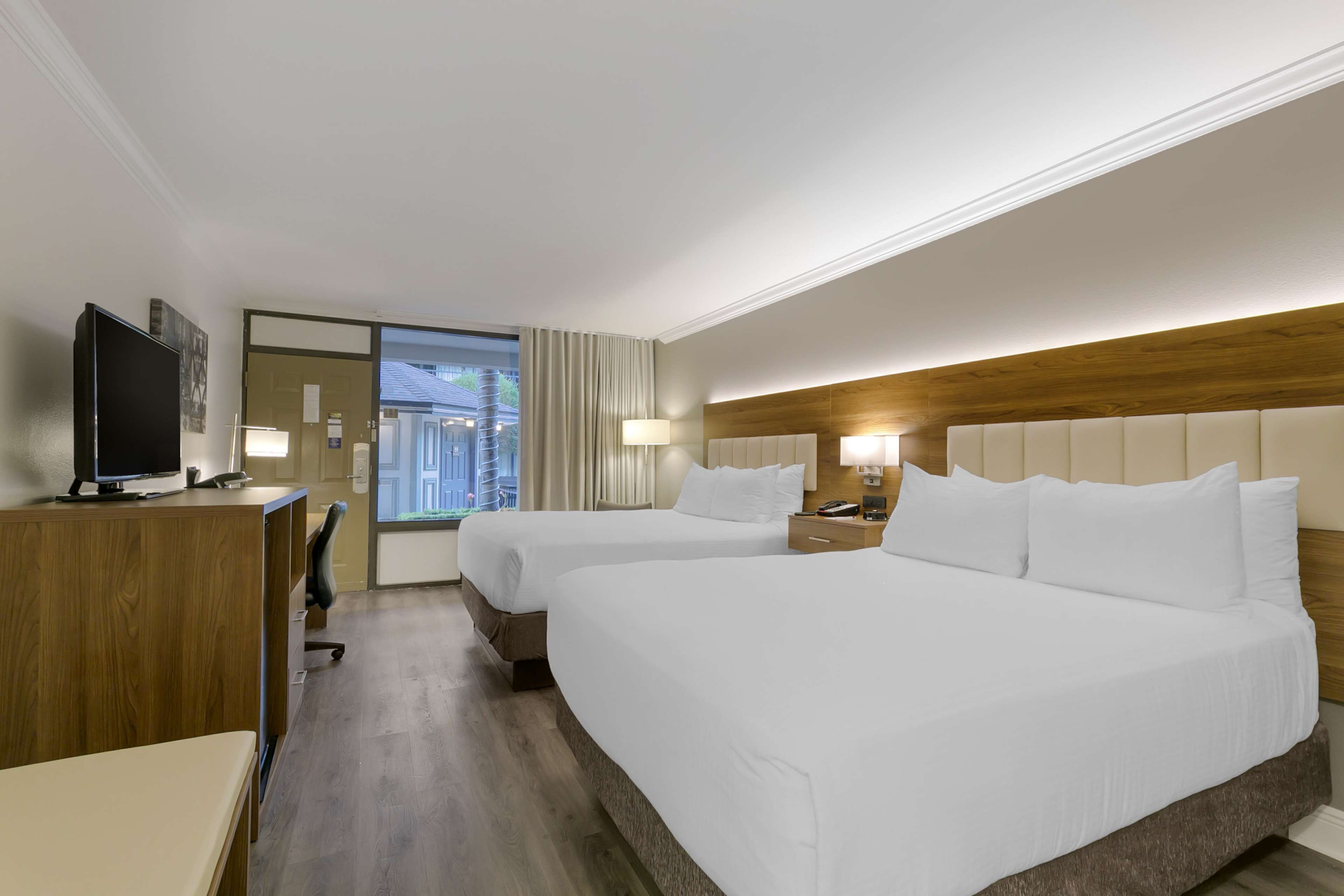 standard room, 2 queen beds, non smoking, refrigerator & microwave | premium bedding, pillow-top beds, in-room safe, blackout curtains