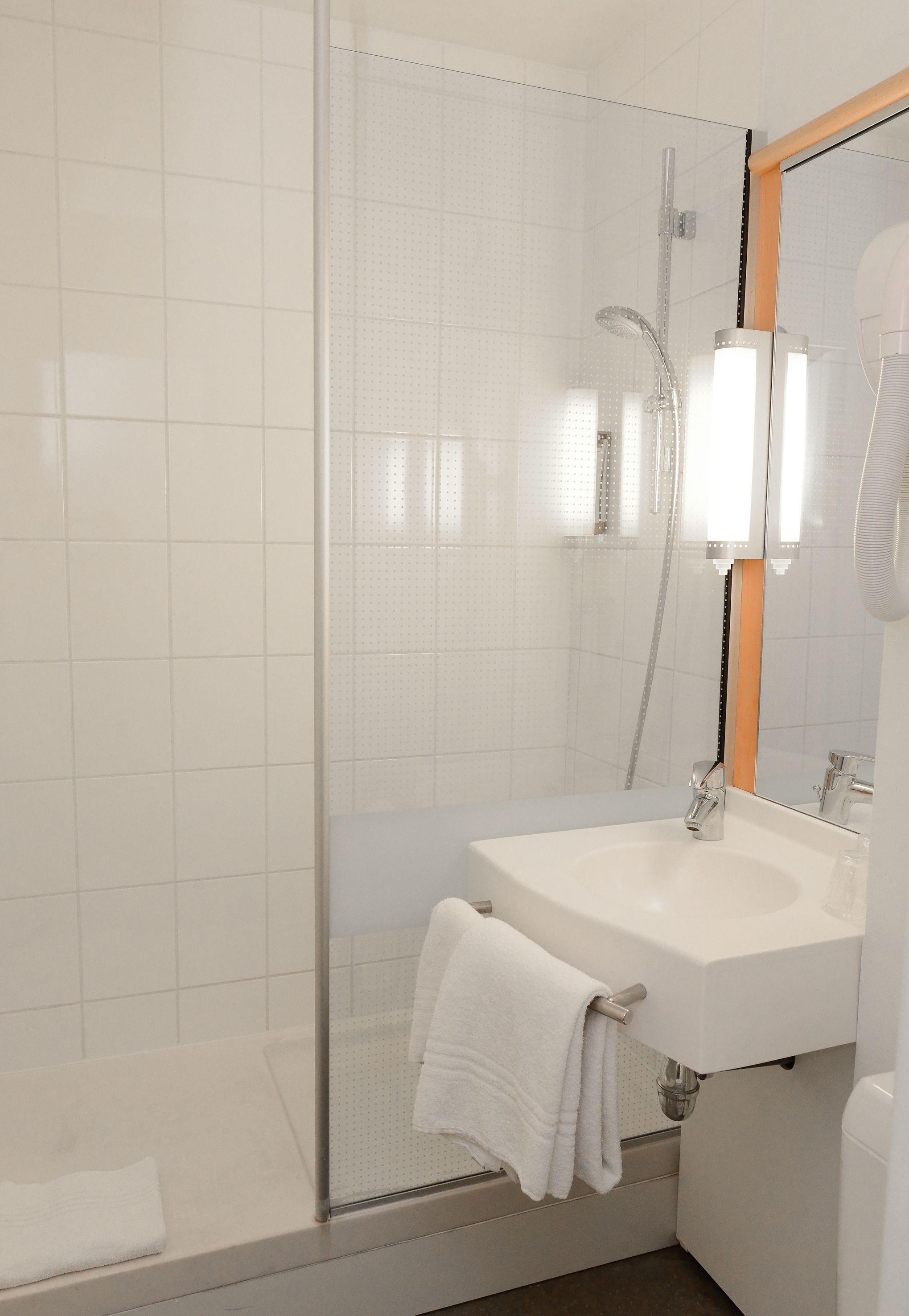 shower, eco-friendly toiletries, towels