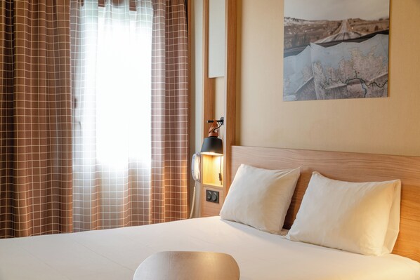 Premium bedding, laptop workspace, soundproofing, iron/ironing board