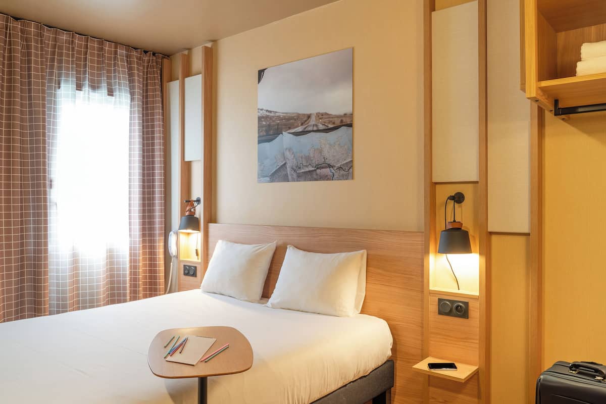 Premium bedding, laptop workspace, soundproofing, iron/ironing board