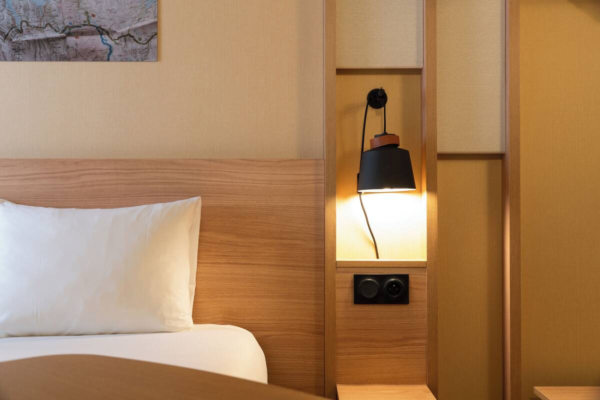 premium bedding, laptop workspace, soundproofing, iron/ironing board