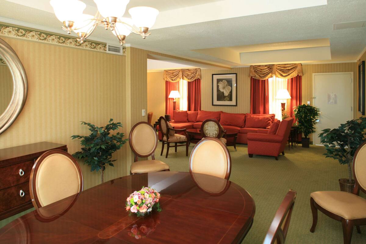Presidential Suite, 1 King Bed | Living area | LCD TV, pay movies