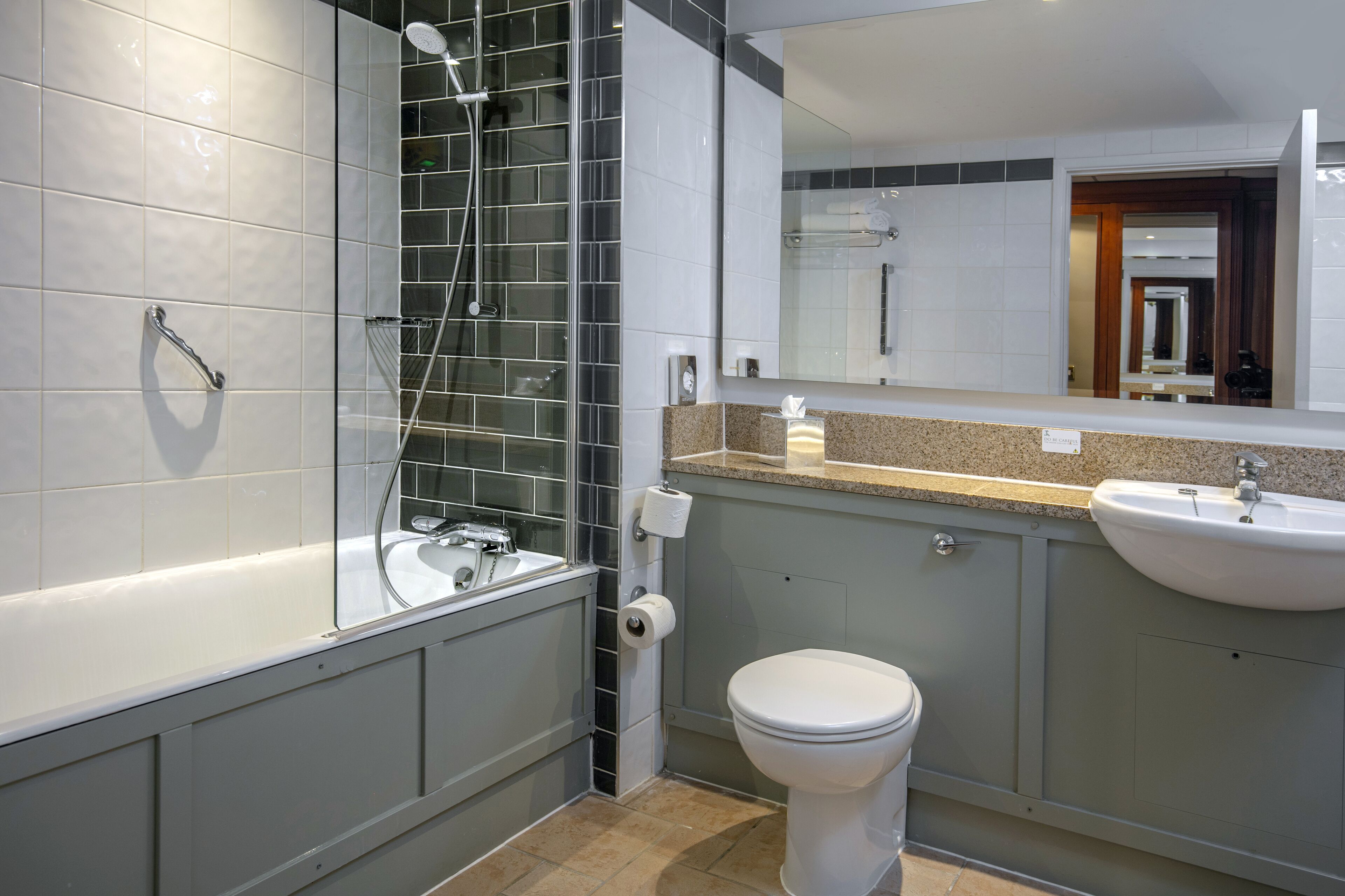 combined shower/bathtub, free toiletries, hair dryer, towels