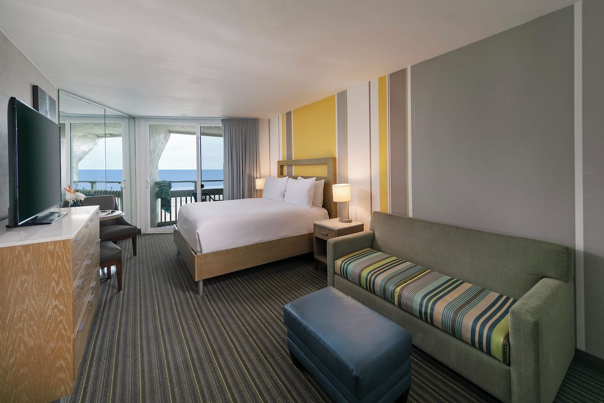 premier room, 1 king bed, balcony, ocean view | 1 bedroom, in-room safe, blackout curtains, iron/ironing board