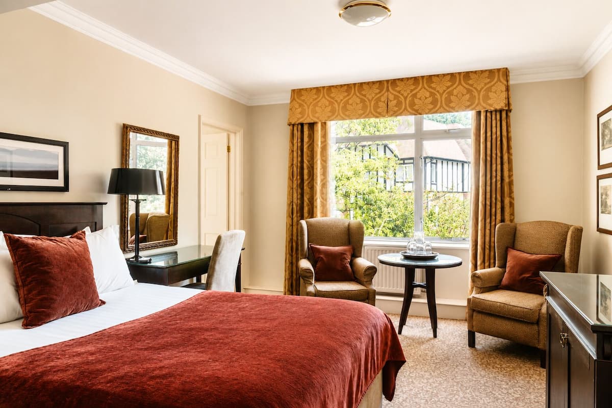 In-room safe, desk, blackout curtains, iron/ironing board