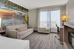 Suite, 1 King Bed, Non Smoking (Upgrade) | Desk, laptop workspace, blackout drapes, soundproofing