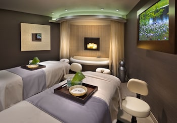 Couples treatment rooms, sauna, spa tub, steam room, body treatments at Atlantis Casino Resort Spa
