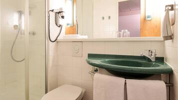 Shower, eco-friendly toiletries, hair dryer, towels