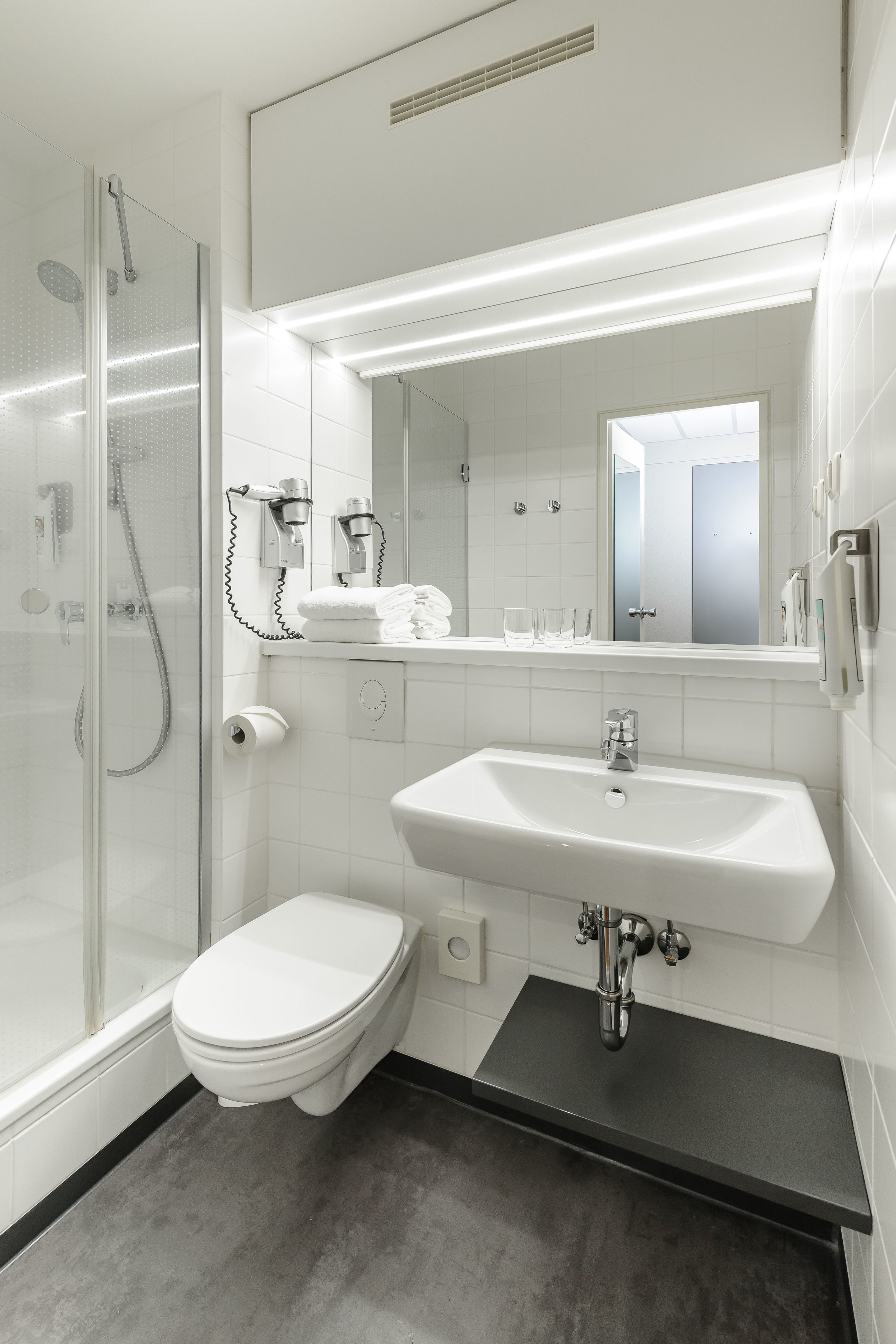 shower, eco-friendly toiletries, hair dryer, towels