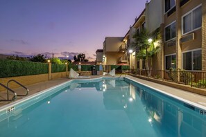 Outdoor pool, open 10 AM to 10 PM, sun loungers