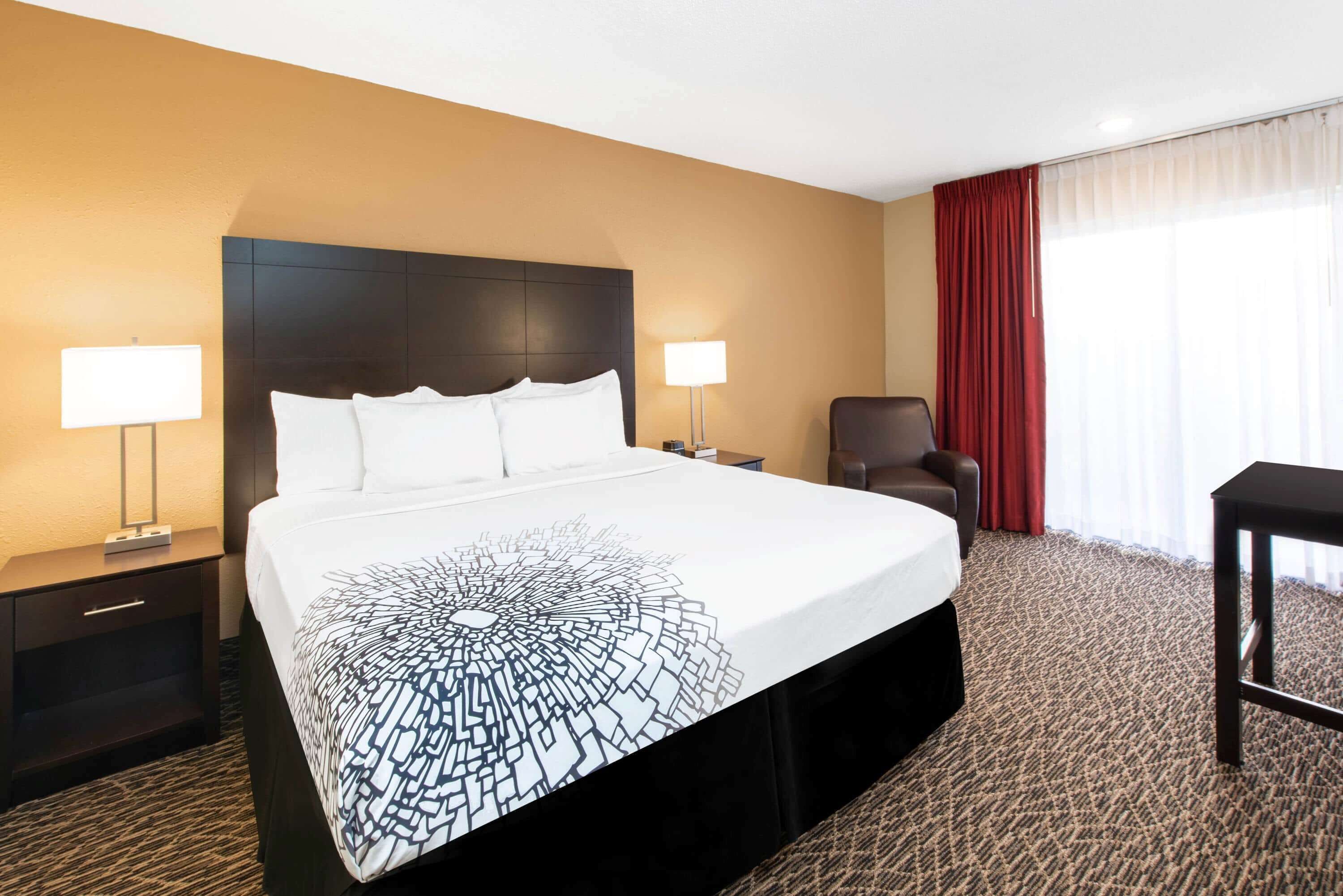 room, 1 king bed, non smoking | premium bedding, desk, laptop workspace, blackout curtains