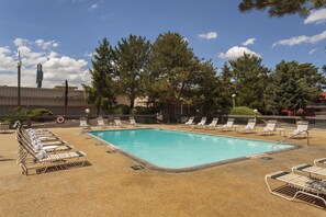 Seasonal outdoor pool, pool loungers