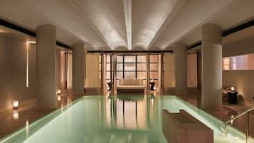 Indoor pool, open 8:00 AM to 9:00 PM, pool loungers