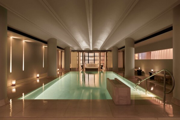 Indoor pool, open 8:00 AM to 9:00 PM, pool loungers
