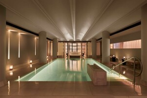 Indoor pool, open 8:00 AM to 9:00 PM, pool loungers