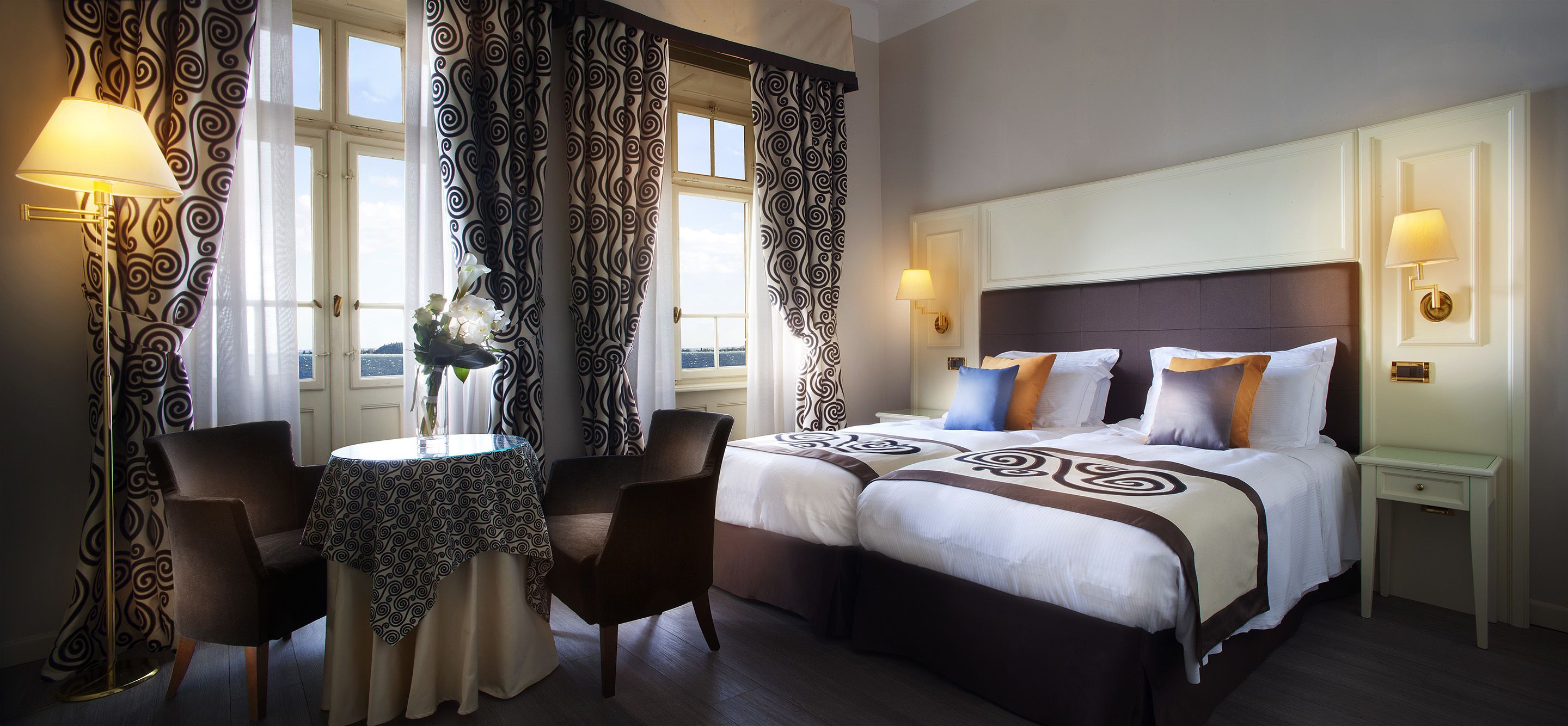 superior double room, balcony, lake view | hypo-allergenic bedding, minibar, in-room safe, desk