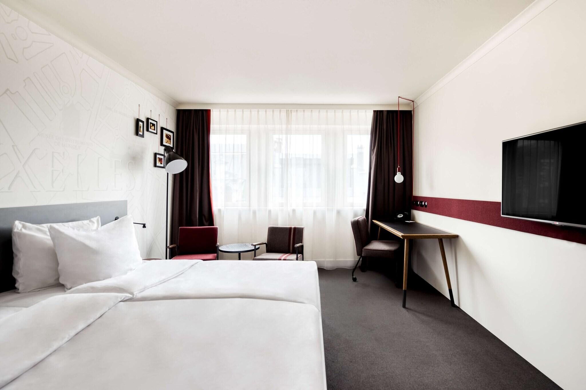 Luxe beddengoed, een kluis op de kamer, verduisterende gordijnen