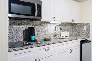 Microwave, stovetop, coffee/tea maker, toaster