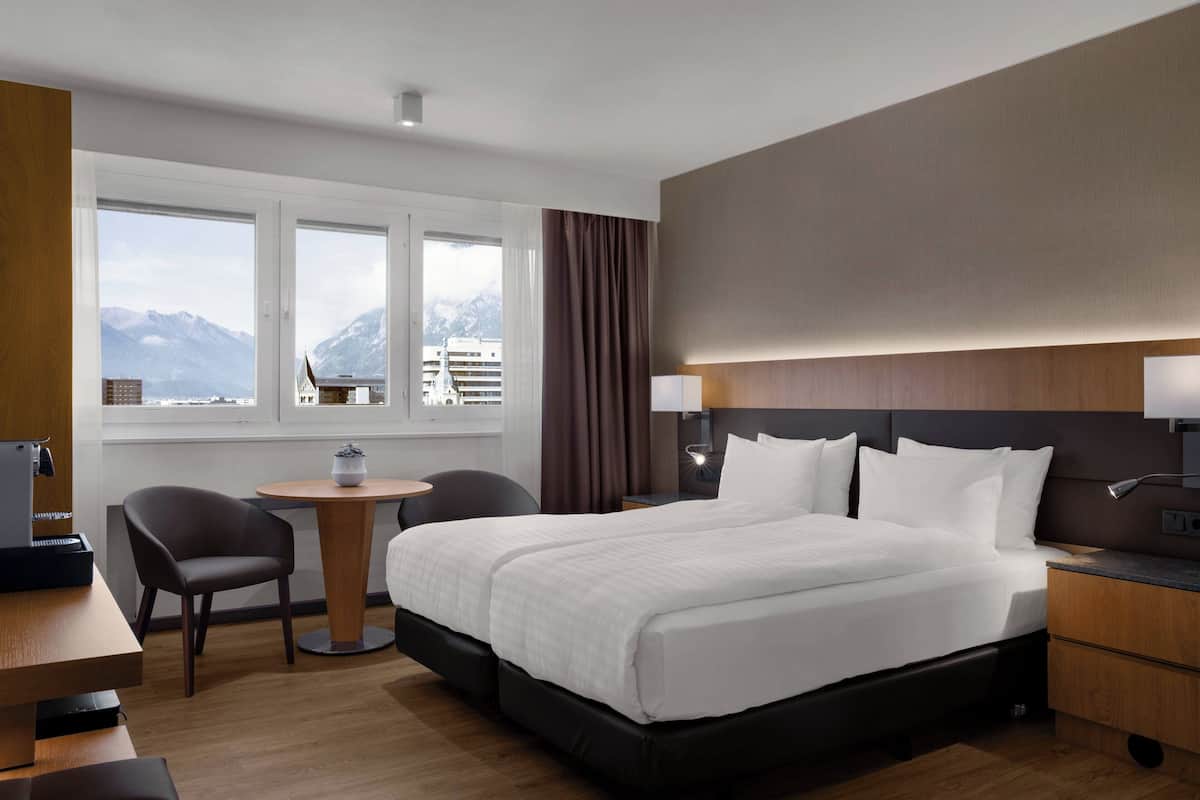 hypo-allergenic bedding, in-room safe, desk, blackout curtains