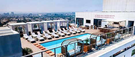 Outdoor pool, free pool cabanas, pool umbrellas