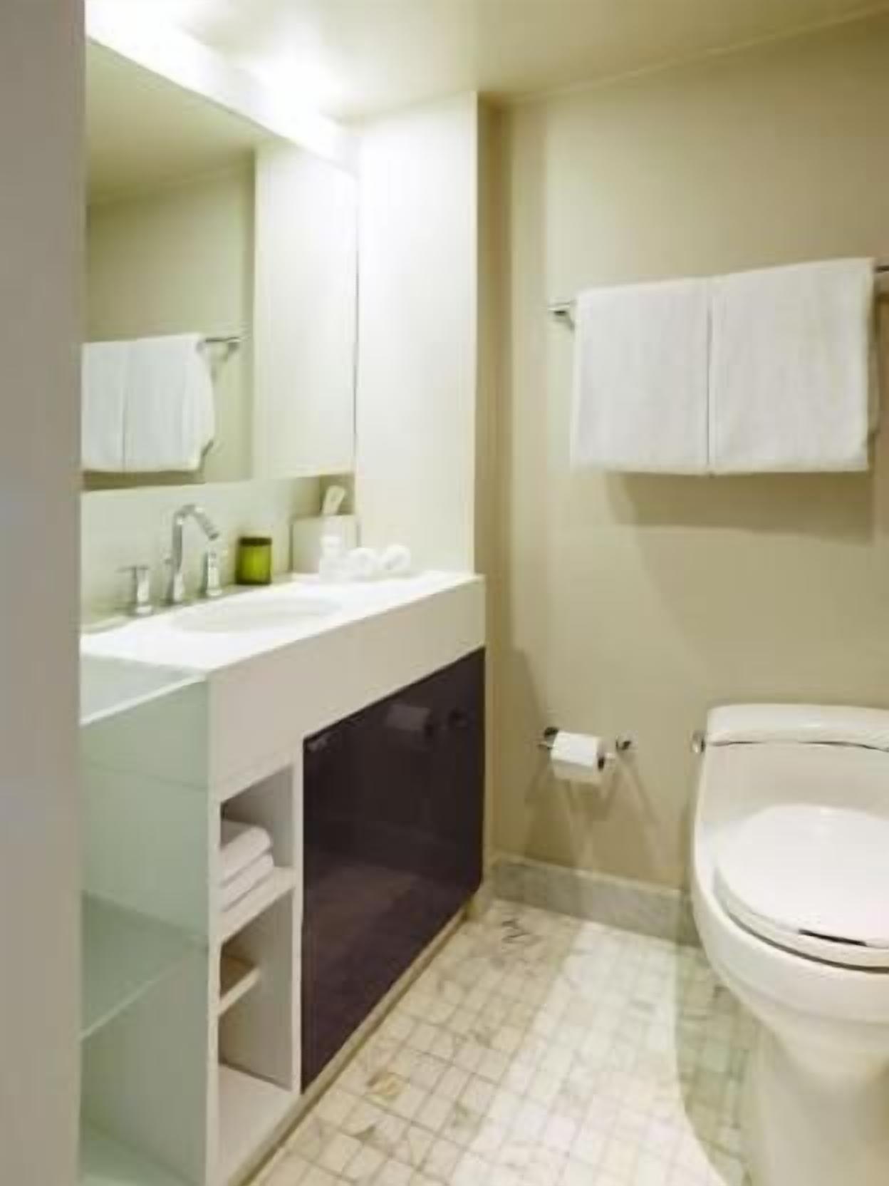 Bathroom | Shower, designer toiletries, hair dryer, towels