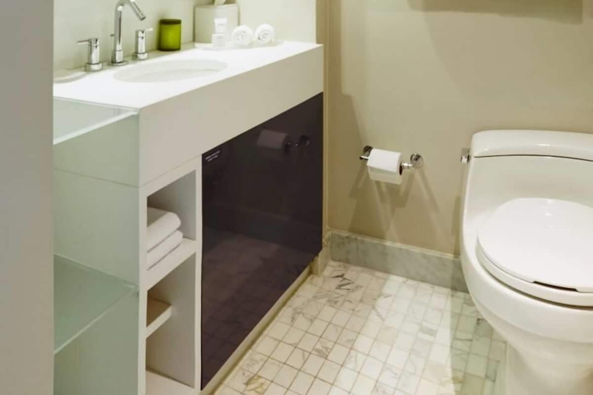 Shower, designer toiletries, hair dryer, towels