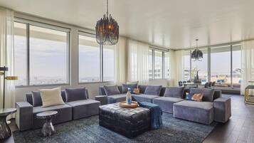 Premium bedding, down comforters, free minibar items, in-room safe