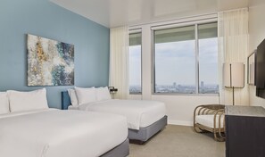 Premium bedding, down comforters, free minibar items, in-room safe