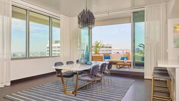 Premium bedding, down comforters, free minibar items, in-room safe