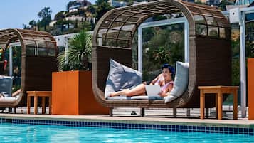 Outdoor pool, free pool cabanas, pool umbrellas