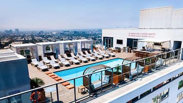 Outdoor pool, free pool cabanas, pool umbrellas