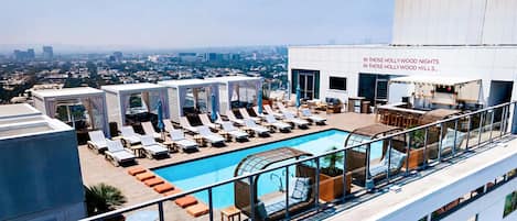 Outdoor pool, free cabanas, pool umbrellas