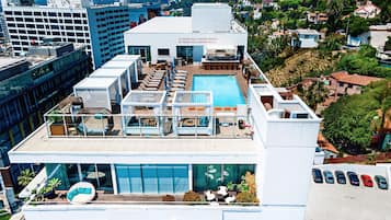 Outdoor pool, free cabanas, pool umbrellas