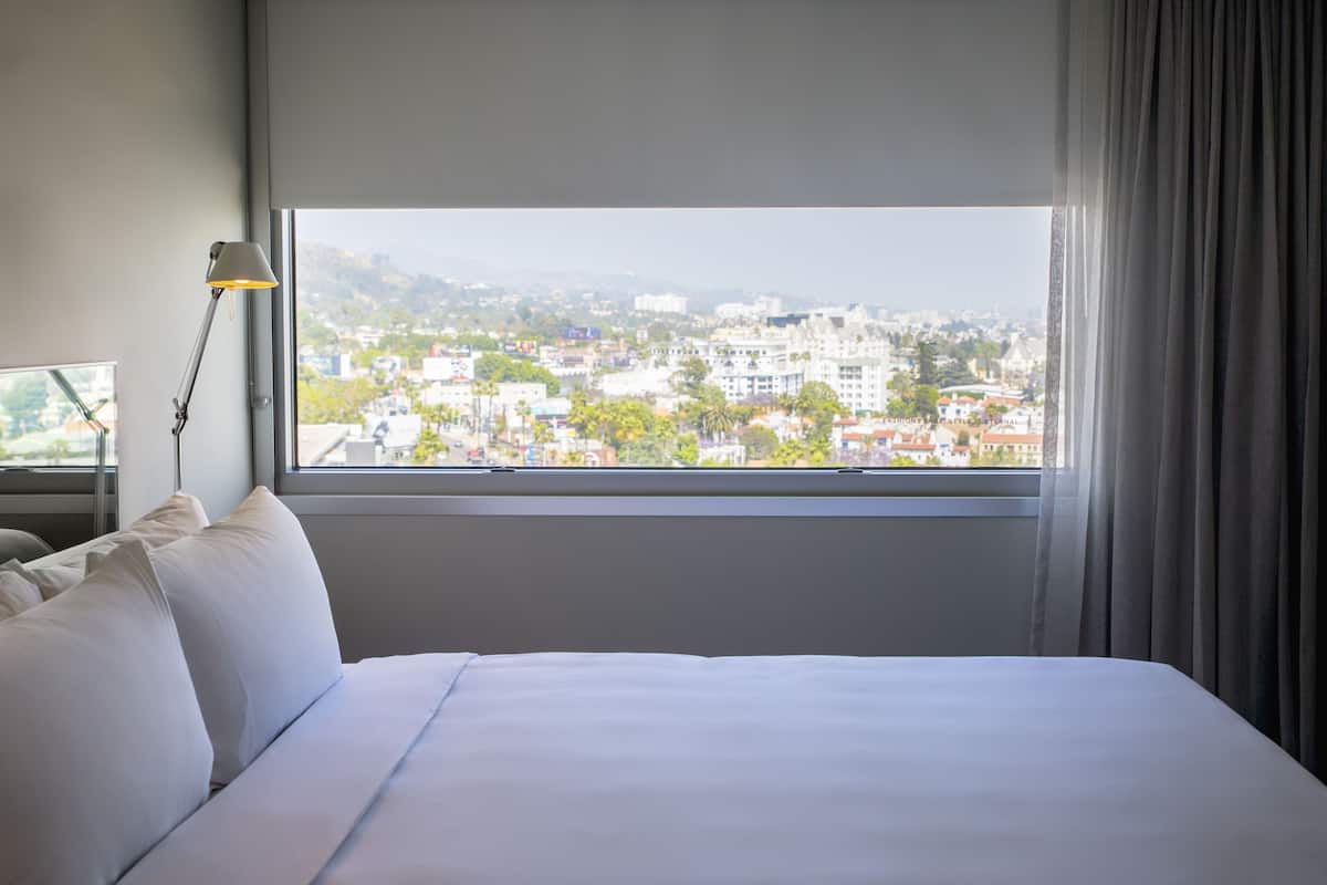 Premium bedding, down duvets, free minibar items, in-room safe